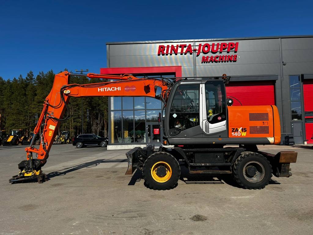 Hitachi ZX 140 W-3 / Little driven, 3 Buckets, Service book!